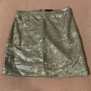Gold mini skirt size medium from Fashion Nova
